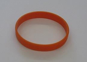 オレンジ色で丸い認知症サポーターの印の「オレンジリング」の写真